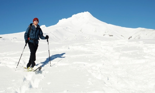 Snowshoeing in front of Mount Hood Oregon